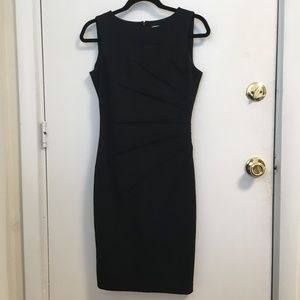 Black Calvin Klein sunburst dress